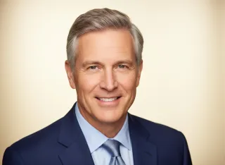 Smiling older man in a suit